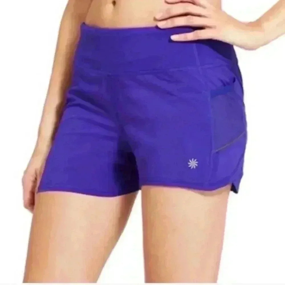 Athleta Ready Set Go Mid Rise Shorts. Ladies size S